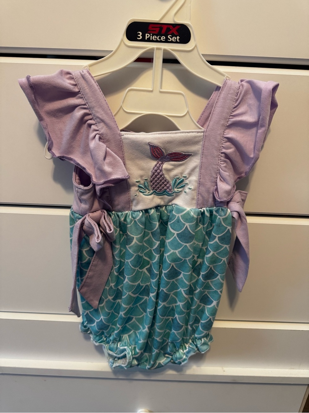NEW WITHOUT TAGS- Abby & Evie
Lavender & Aqua Mermaid Bubble Romper
